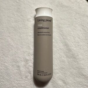 Living Proof Frizz Conditioner in Gray and White